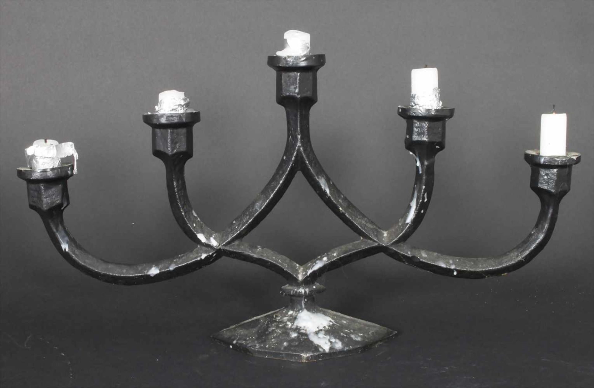 5-flammiger Kerzenleuchter / A 5 flamed candlestickMaterial: Gusseisen, Maße: H. 23 cm, B. 48 cm,