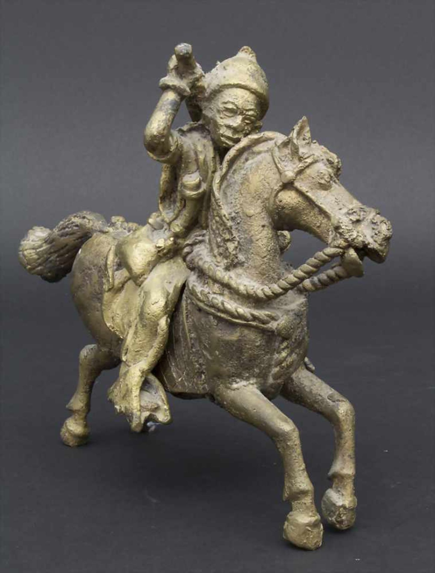 Reiter / Krieger zu Pferd, Benin, NigeriaMaterial: Bronze,Maße: 21 cm,Zustand: Gussfehler.- - -20.00