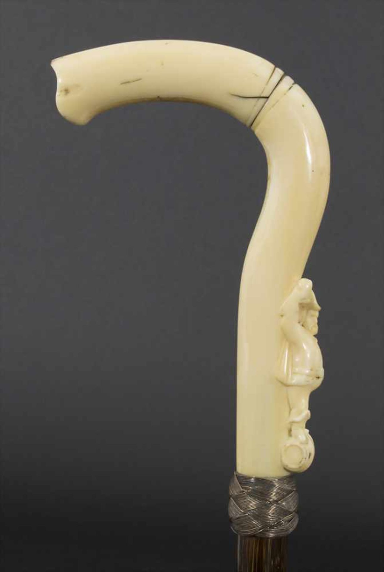 Gehstock mit Figurengriff 'Weintrinker' / A cane with figural handle 'Wine drinker', um