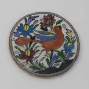 Persische Kachel19. Jh., traditionelle Darstellung eines Vogels in floraler Umgebung, D. 15 cm