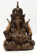 Hinduistische GottheitGanesha in segnender Haltung, Wurzelholz detailliert beschnitzt, H. 25 cm