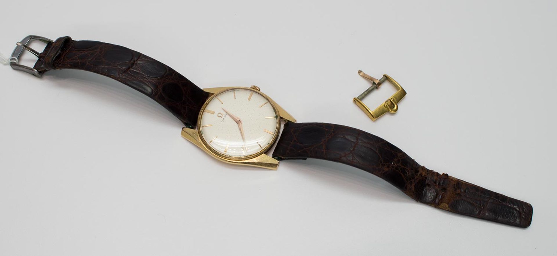 HerrenarmbanduhrOmega 511, Uhrenmanufaktur Omega/ Schweiz 1956, Werksnr. 16439941, 750er (18 kt.) GG
