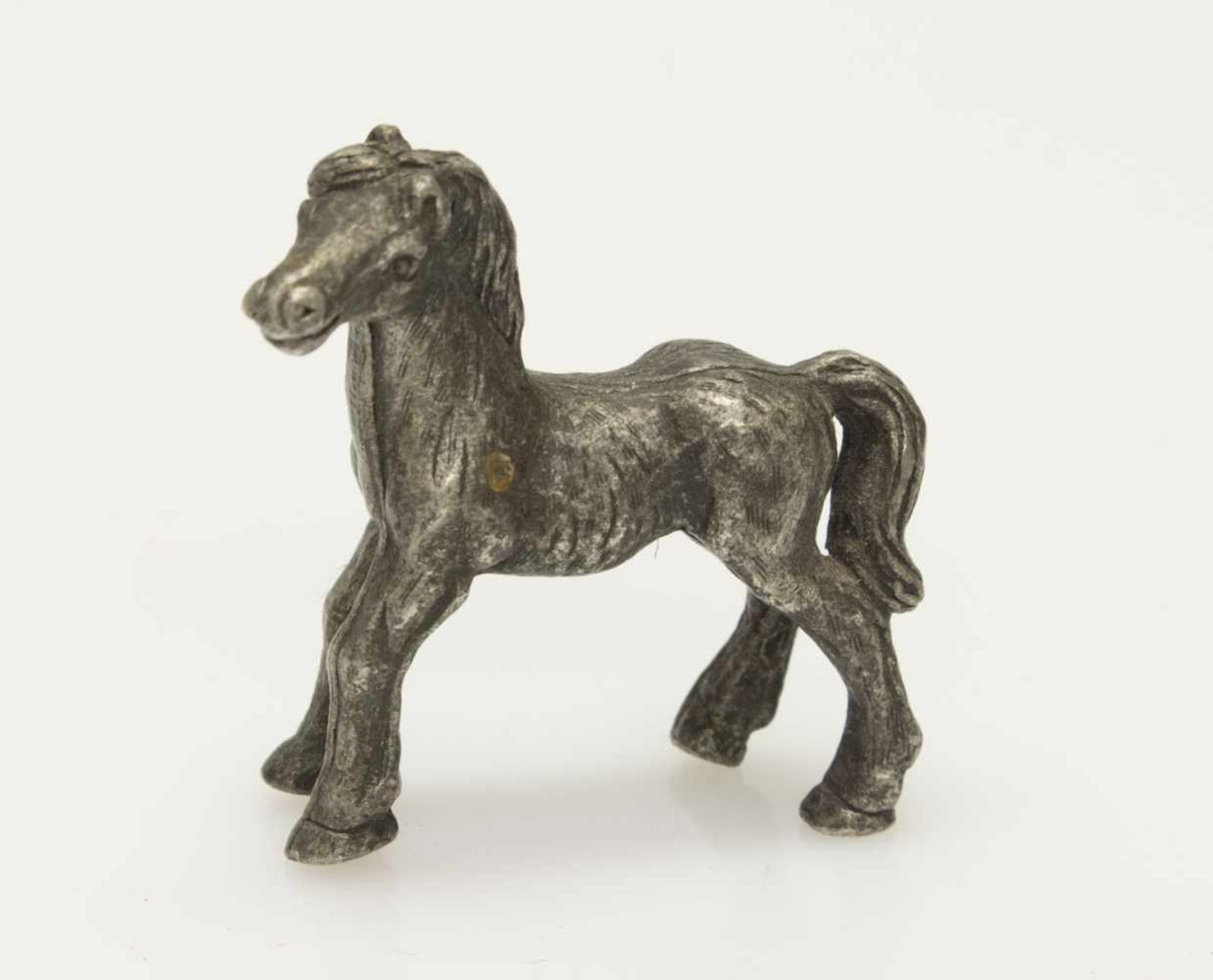 PferdeminiaturKleines Zinnpferd, gemarkt Made in Germany W., L. 3 cm