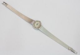 Damenarmbanduhr750er WG-Gehäuse und -Armband, 28,8 g, mit Brillantlünette, 18 Brillanten (ges. ca.