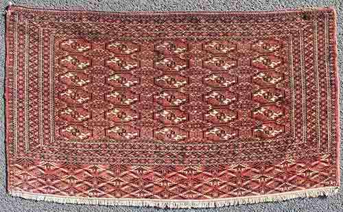 Tekke Tschowal. Turkmenistan. Antik, um 1900.70 cm x 127 cm. Handgeknüpft. Wolle auf Wolle.