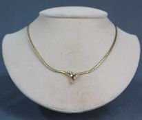 Collier Gold 585 mit 7 Brillanten. Reinheit F, Farbe W (Wesselton).Gesamtgewicht 5,6 Gramm.