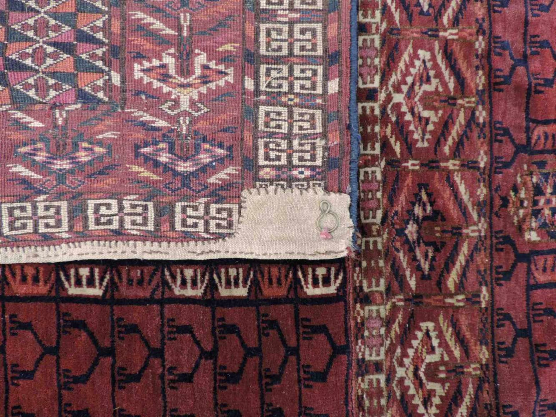 Tekke Ensi Stammesteppich. Turkmenistan. Antik, um 1900.148 cm x 125 cm. Handgeknüpft. Wolle auf - Bild 6 aus 7