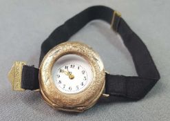 Remontoir Damen Taschenuhr als Armbanduhr. Gehäuse in Gold.28,5 mm Durchmesser ohne Krone.