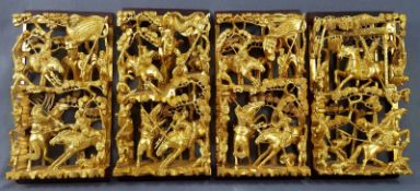 4 Relief Schnitzereien China. Holz. Goldfarben.Je 32 cm x 17,5 cm.4 Carvings China. Wood. Gold