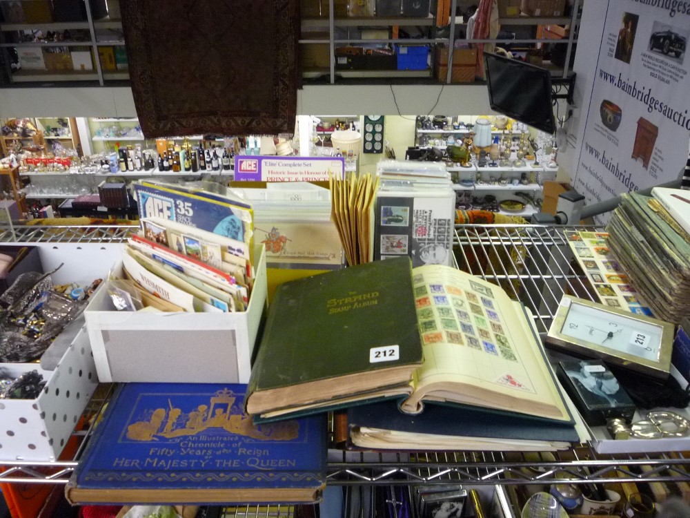 A large stamp lot, including four albums, including The Stand album and The Cardinal Stamp Album,