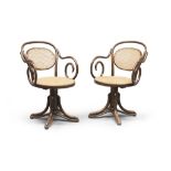 A BEAUTIFUL PAIR OF THONET ARMCHAIRS IN BEECH TREE, EARLY 20TH CENTURY with oval backs, curled