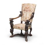 SPLENDID WALNUT ARMCHAIR, BRUSTOLON STYLE, LATE 19TH CENTURY with high back, arms with sculptures of