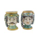 A PAIR OF MAIOLICA VASES, SICILY 20TH CENTURY polychrome enamels, animated to male and female