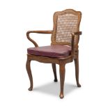 ARMCHAIR IN BEECH TREE, PROBABLY FRANCE, 18TH CENTURY with back and seat in woven cane and shaped