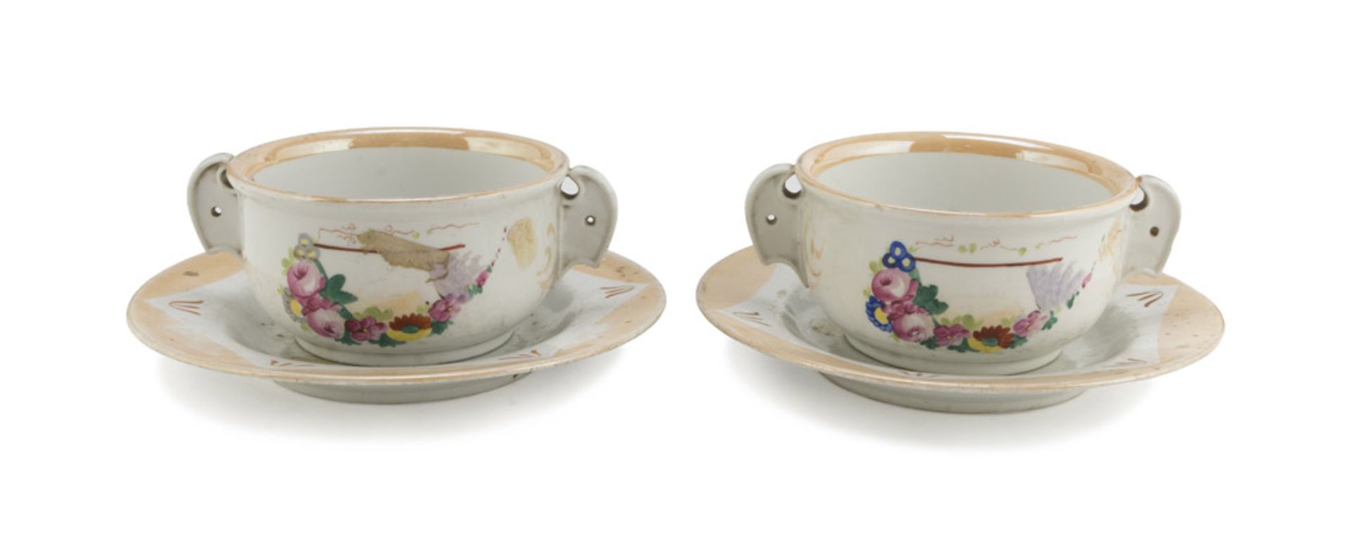 TWO SOUP CUPS IN PORCELAIN, 19TH CENTURY with saucers, in white, yellow and polychrome enamel,