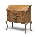 SMALL FLIP TOP CABINET IN WALNUT, PROBABLY PARMA, ELEMENTS OF THE 18TH CENTURY with carved