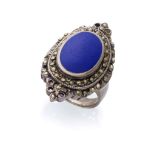 RING with mount in silver and central hard stone with contour of marcasites. Total weight gr. 7,