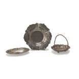 THREE SMALL BASINS IN SILVER-PLATED METAL of various shapes, embossed with floral motifs. Maximum