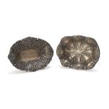 TWO SMALL SILVER BASINS, UNITED STATES 20TH CENTURY oval shape, embossed with floral motifs. Title