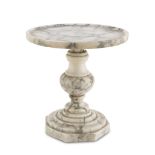 CAKESTAND IN WHITE MICHELANGELO MARBLE, EARLY 20TH CENTURY with flat basin and baluster upright.