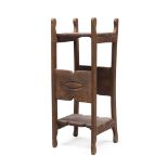 ETAGERE, 20TH CENTURY with shaped uprights and engraved cartouches. Measures cm. 83 x 30 x 25.