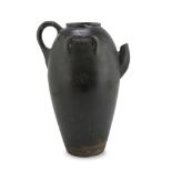 JUG IN CERAMICS, EARLY 20TH CENTURY inblack enamel with baluster body. Measures cm. 41 x 21 x 25.