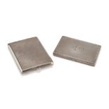 TWO CIGARETTE BOXES IN SILVER, EARLY 20TH CENTURY dotted bodies with slight floral engravings.