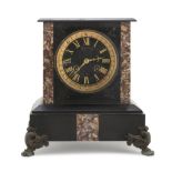 TABLE CLOCK, LATE 19TH CENTURY case in black marble from Belgium, finishings in African marble. Claw