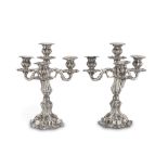 A PAIR OF CANDELABRA IN SILVER, ITALY LATE 19TH CENTURY four flames with embossed shaft and base.
