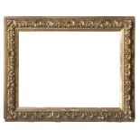 BIG FRAME IN GILDED WOOD AND PLASTER, 19TH CENTURY decorated with relief of palmette and floral