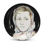 POTTER OF THE 20TH CENTURY Woman's face with handkerchief, 1959 enameled and glazed ceramic dish,