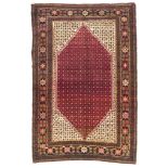 SENNÈ CARPET, EARLY 20TH CENTURY with design of roses and leaves, in the center field on red and