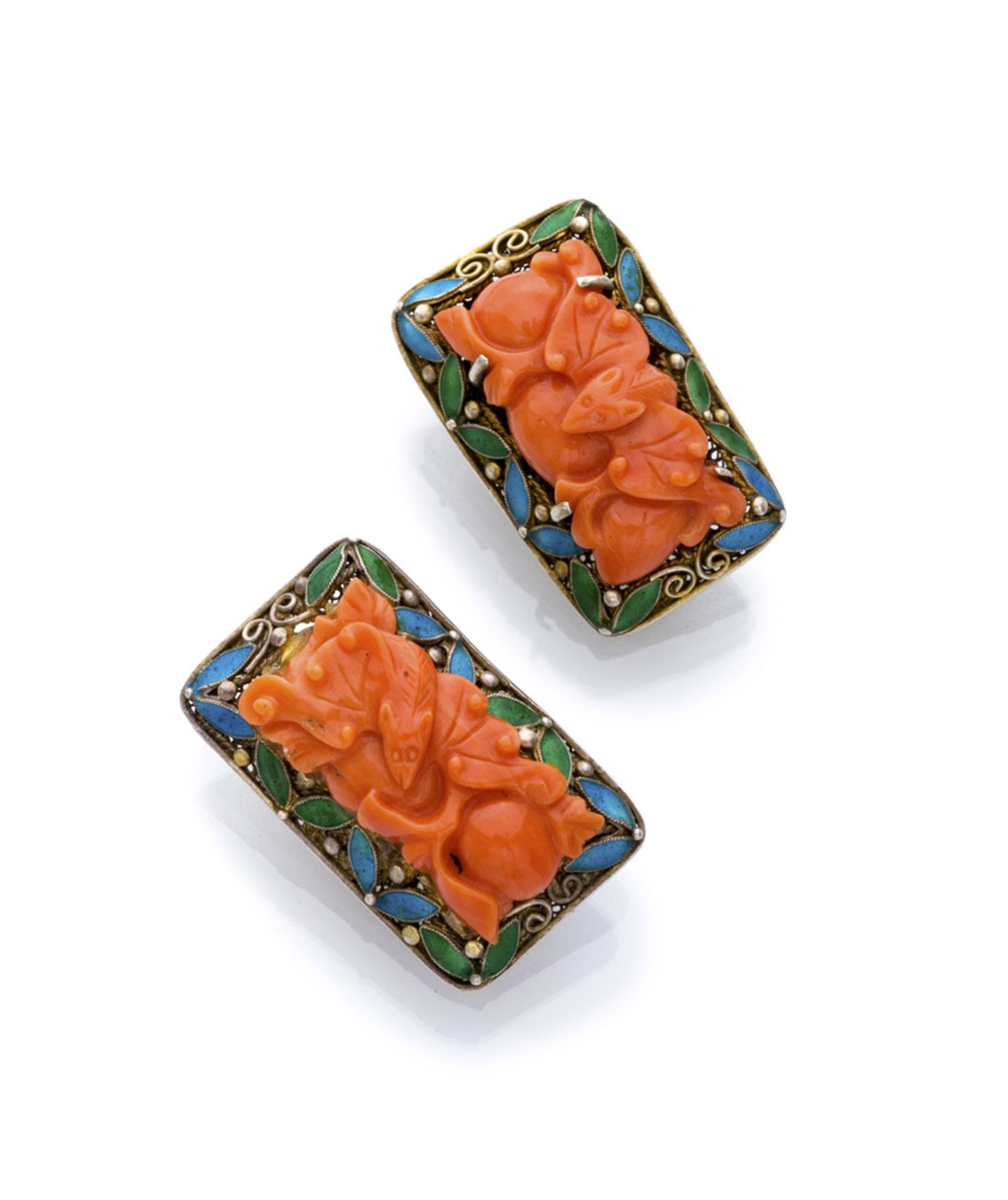 A PAIR OF EARRINGS in silver, with pink corals engraved with bat motifs set on a mount of