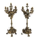 A PAIR OF CANDELABRA IN BRASS, LATE 19TH CENTURY composed of leaves, with shaft twisted and five