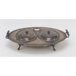 SILVER-PLATED FOODWARMER, UNITED KINGDOM EARLY 20TH CENTURY, two oval basins with covers, centered