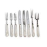 EIGHT PIECES OF SILVER-PLATED FLATWARE, PUNCH GERMANY, 20TH CENTURY with nacre handles. Length cm.
