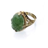 RING with mount in silver and central jade engraved with flower shape. Total weight gr. 6. ANELLO