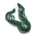 BEAUTIFUL TORCHON CHOKER six threads of emeralds with clasp in yellow gold 18 kts. Length cm. 46,