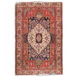 RARE CARPET FEHERAGAN, EARLY 20TH CENTURY medallion with shoots of flowers on white ground in the