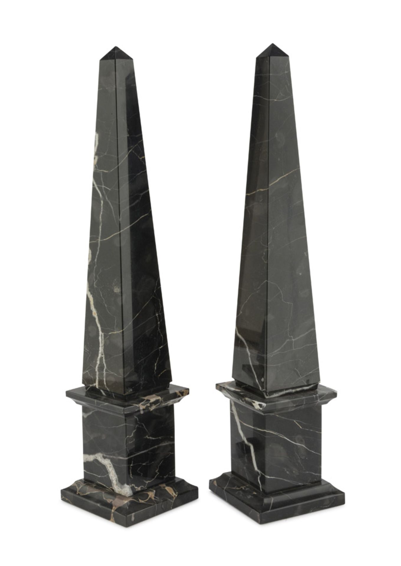 A PAIR OF OBELISK MODELS IN PORTORO MARBLE, 20TH CENTURY Measures cm. 42 x 9 x 9. COPPIA DI