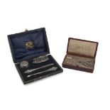 TWO SEWING SETS IN SILVER, PUNCHES BIRMINGHAM, 1910 elements embossed with floral motifs. Title