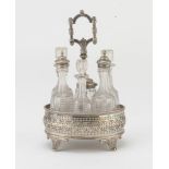 CRUET IN SILVER-PLATED METAL, UNITED KINGDOM 19TH CENTURY, oval shape with six bottles in cut