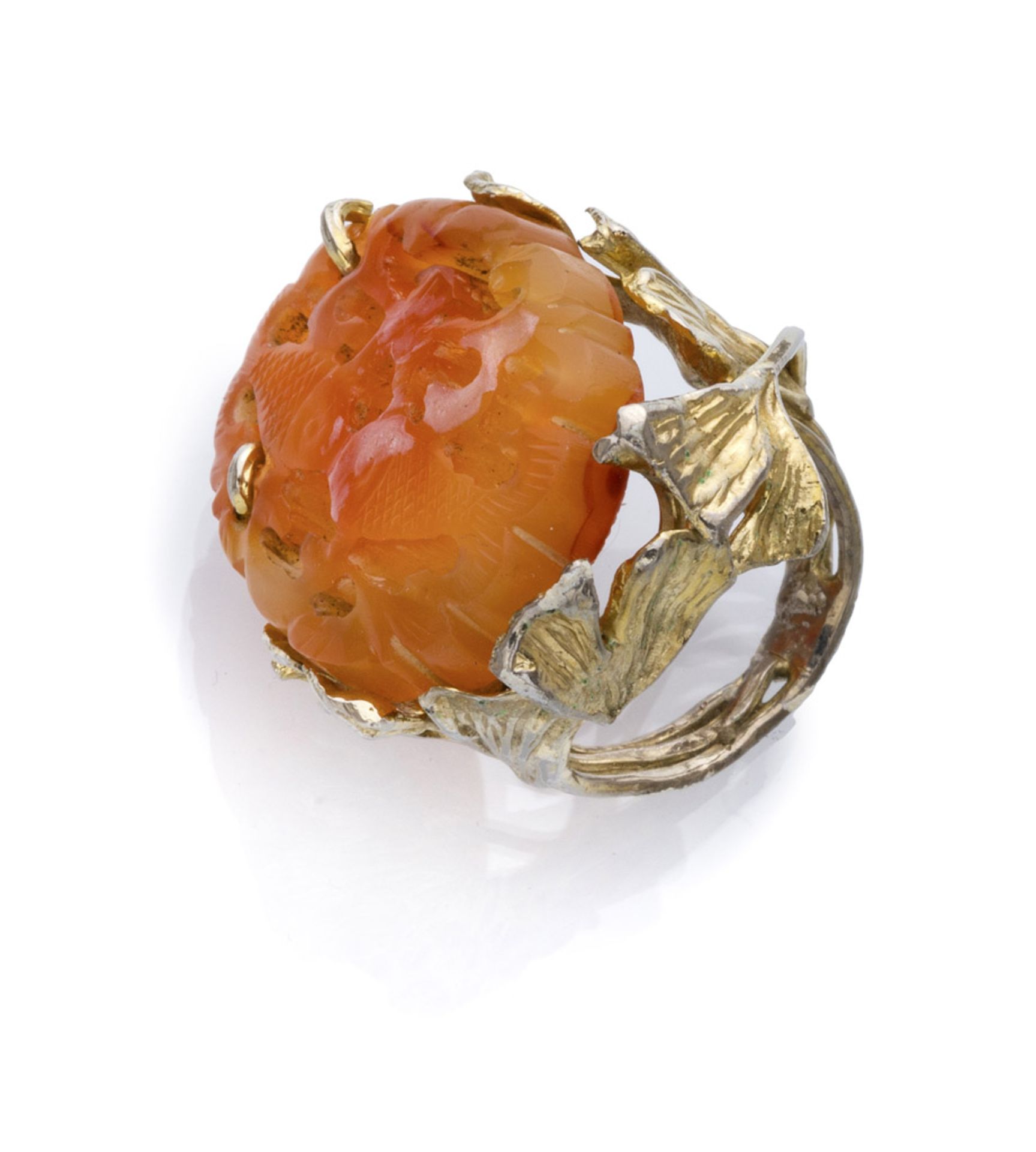 ATTRACTIVE RING with mount in gilded metal and central corniola engraved with fishes. Total weight