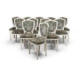TWELVE CHAIRS IN WHITE LACQUERED WOOD, 19TH CENTURY of taste Luigi XVI, with shield backs and