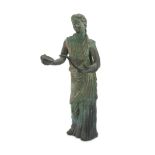 FIGURE OF FEMALE OFFERER IN BRONZE, 20TH CENTURY from original of 300-250 B.C. Body underlined by
