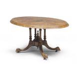 OVAL TABLE IN OLIVE, ENGLAND LATE 19TH CENTURY with inlays and threads in satin wood. Oval top, four