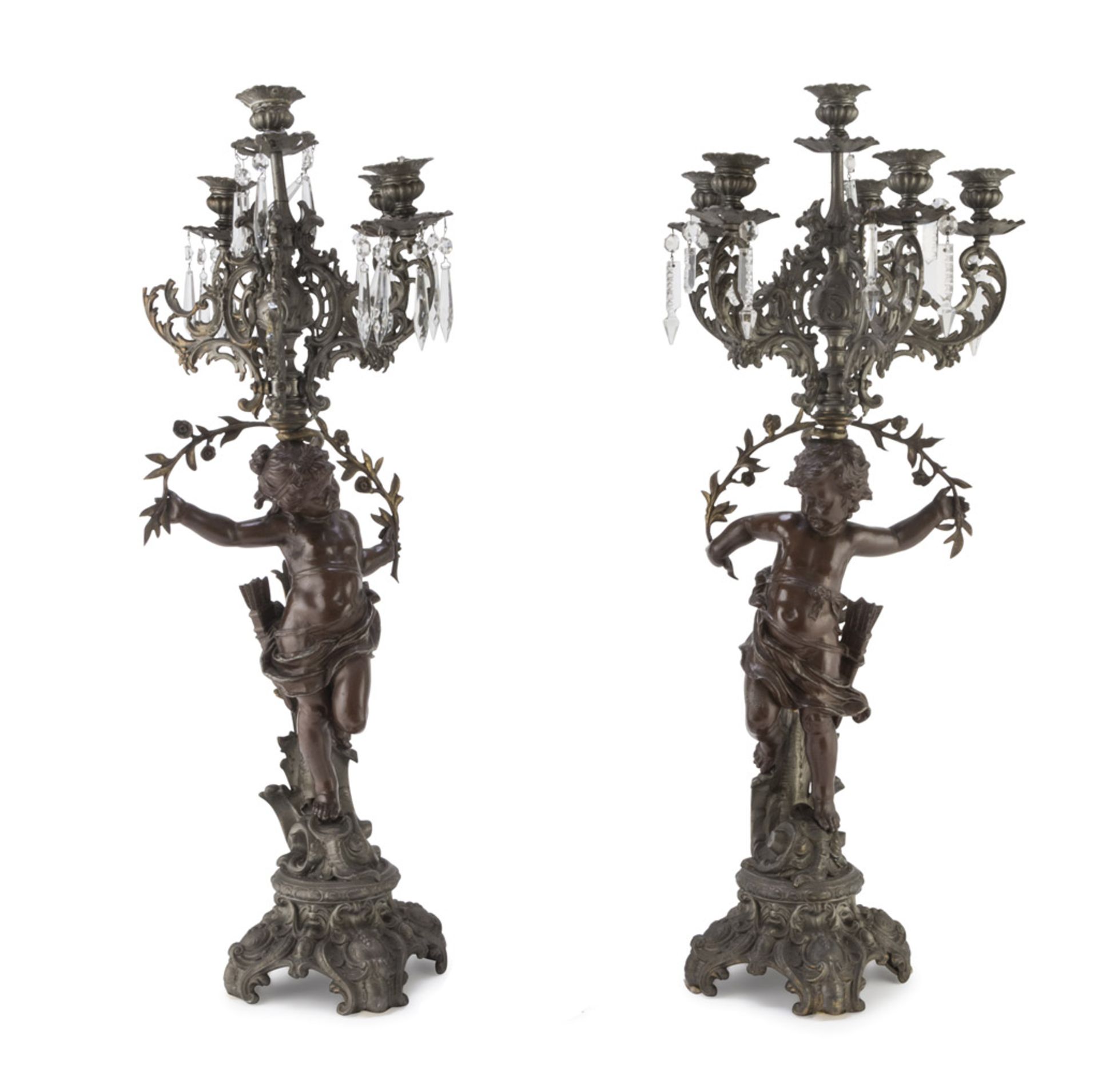 A PAIR OF CANDELABRA IN BRONZE, EARLY 20TH CENTURY six arms, leaning on shafts decorated with