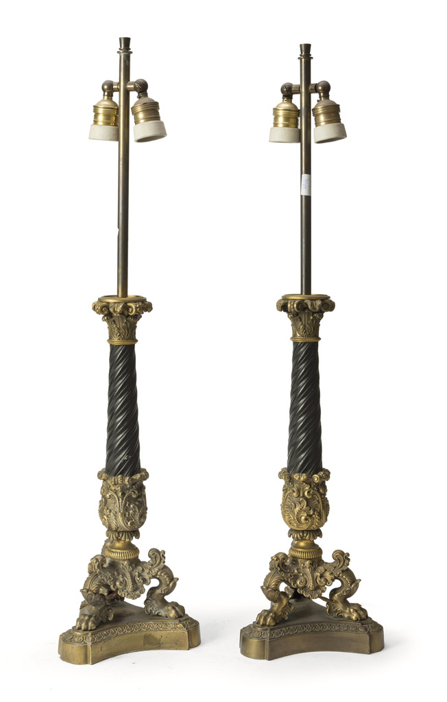 PAIR OF CANDLESTICKS IN ORMOLU, PERIOD OF THE SECOND EMPIRE black and gilt patina, twisted shaft and