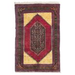 HAMADAN CARPET, EARLY 20TH CENTURY double lozenge medallion with motifs of shoots with Herat pattern