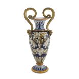 CERAMIC VASE, DERUTA MID-20TH CENTURY polychrome enamelled and decorated with twisted leaves,